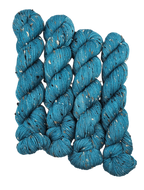 Teal skeins of yarn with donegals on a white background