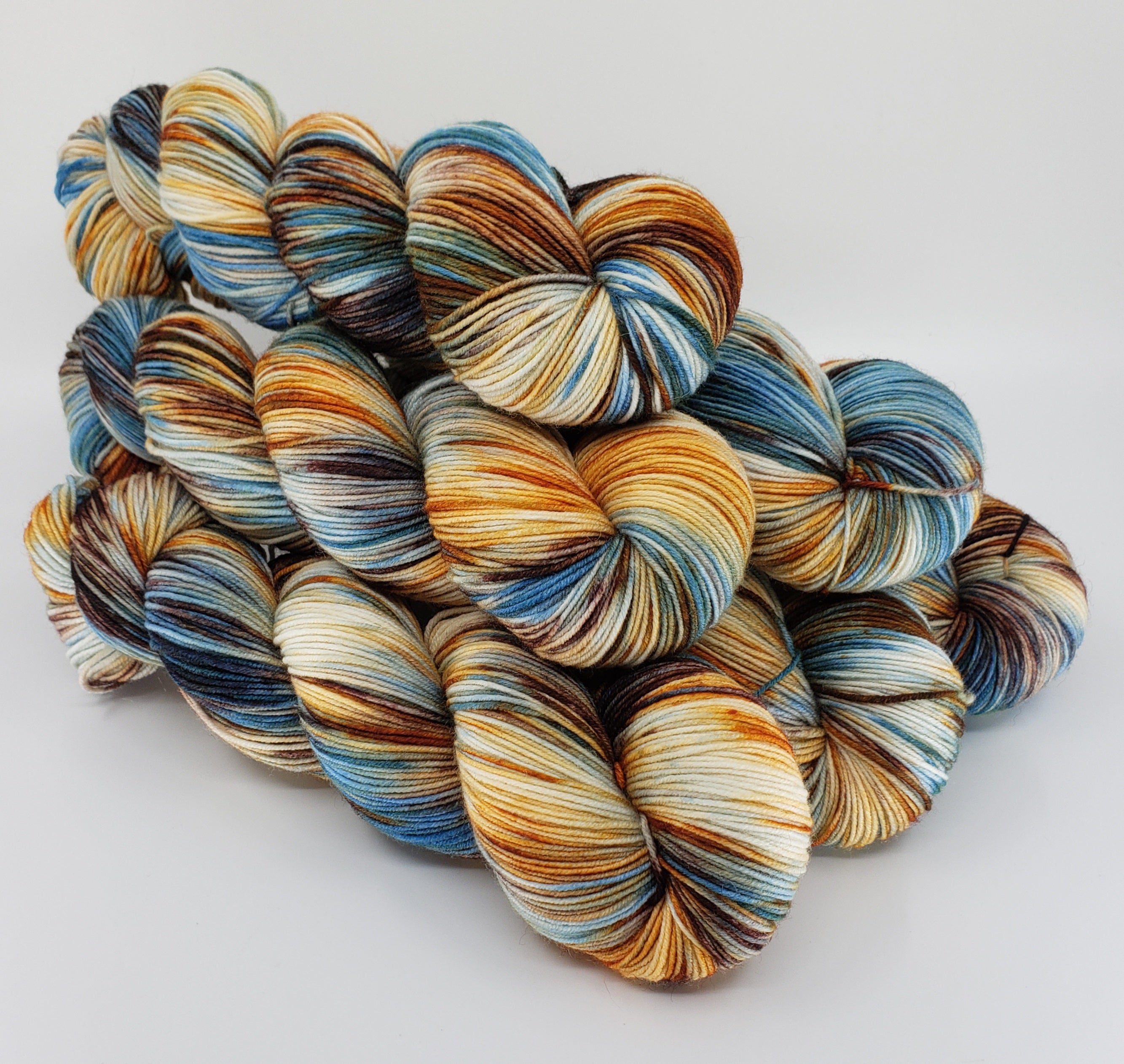 Mango Beach - Variegated Merlin 100 - CHAOS Fiber Co
