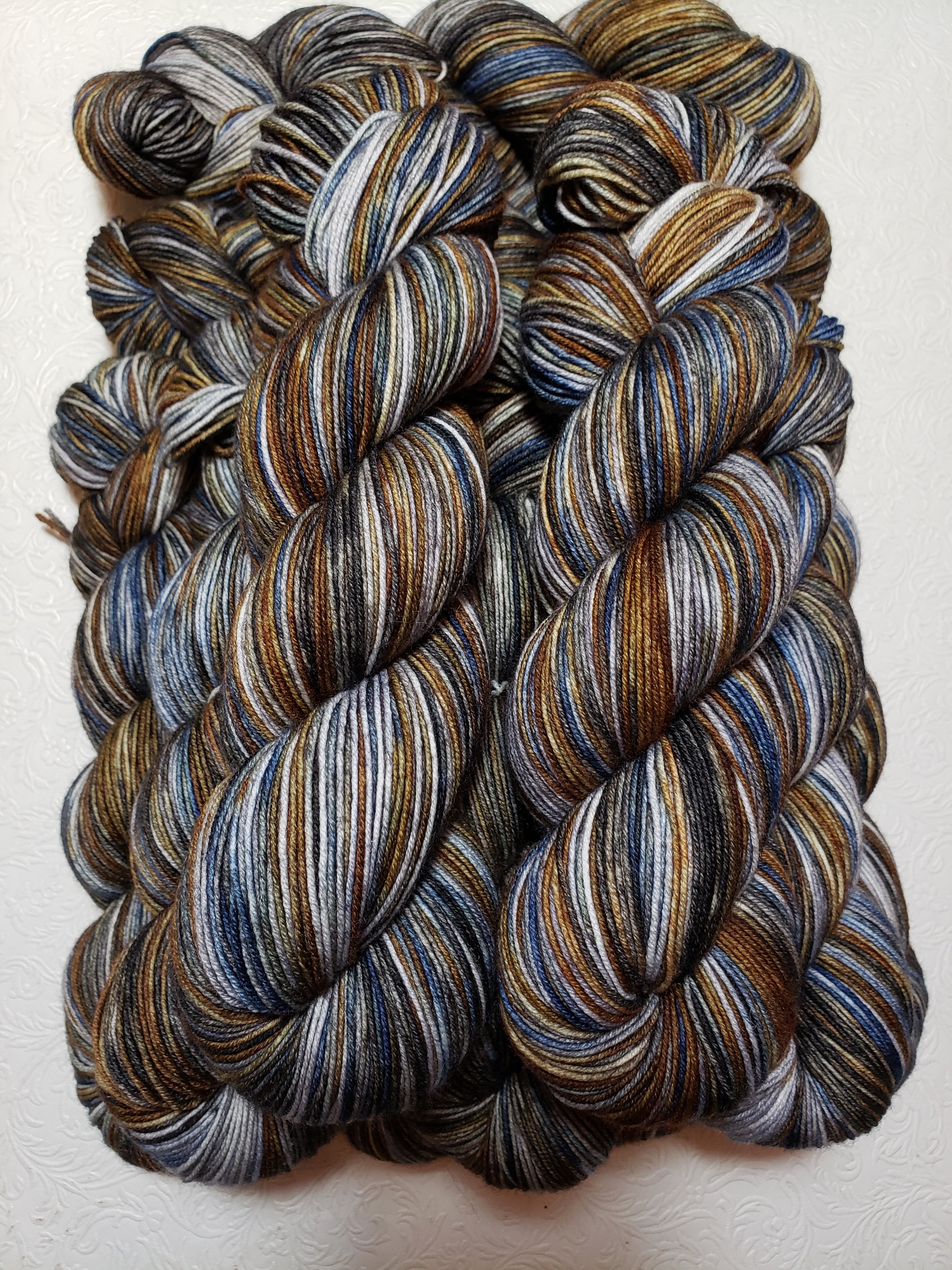 SteamPunk - Variegated Merlin 100 - CHAOS Fiber Co